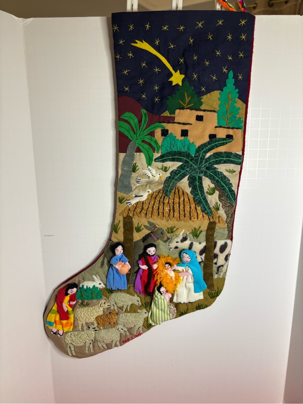 Lucuma Christmas Stocking  a Nativity scene in Multicolor Signed Anselma.